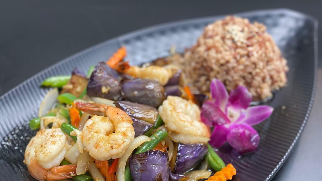  Eggplant Lover · Sautéed eggplant, bell peppers, green bean, onions, carrots, crushed chili and basil in our house sauce. served with choice of jasmine rice or organic brown rice.