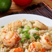 Thai Fried Rice · Choice of chicken, veg. or tofu, stir fried with onions, egg, peas and carrots.