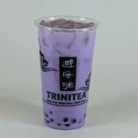 Taro Milk Tea · Milk drink sweetened with sugar and a splash of taro flavor. Purple color. Dairy free. Caffe...