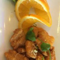 Orange Chicken · Lightly battered and flashed fried soy chicken in a homemade caramelized tangy orange sauce....