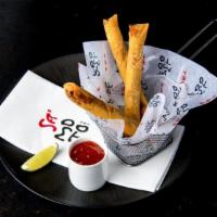 Crab Spring Rolls · Crab Spring Rolls filled filled with crab and mayo, served with apricot chili sauce.