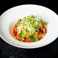 Vegetable Dan Dan · Chilled broth-less noodles, garlic chili oil, lettuce, cilantro, and nuts.