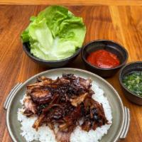 Smoked Pork Shoulder Ssam · Served with rice, bibb lettuce, ssamjang, and ginger scallion.