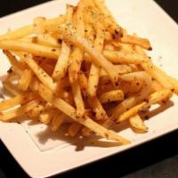 Cajun Garlic Fries · French fries tossed in a garlic Cajun sauce