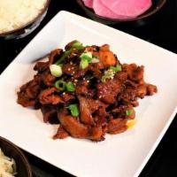 Chili Pork Dinner · Spicy pork loin filet, served with rice and Korean side dishes.