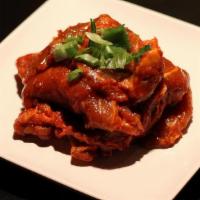 Chili Pork Lb (Uncooked) · Spicy. Finely sliced pork marinated in chili sauce.