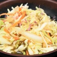 Wasabi Salad · Cabbage salad topped with house made wasabi dressing.