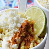 Esquite (Corn Cup) · Hot yellow corn topped with butter, mayonnaise, lime juice, queso seco 
