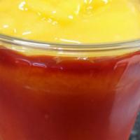 Reptiliana · Real mango pieces blended together with ice, real lime juice, and real mango syrup topped wi...