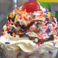 Sundae · Choice of ice cream topped with whipped cream, chocolate, caramel, sprinkles and cherry on t...