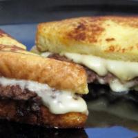 Sourdogh Burger Melt · 1/4 pound  Patty, Grilled Sourdough with 2 slices of cheese, mayo, grilled onions & tomato.