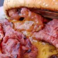 Pastrami Burger · 1/4 Pound. Served with Thousand dressing, onion, pickle and tomato on a toasted sesame bun w...