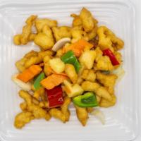 Sweet & Sour Chicken · Crispy breaded white meat chicken with bell pepper, onion, carrots, and diced pineapple glaz...