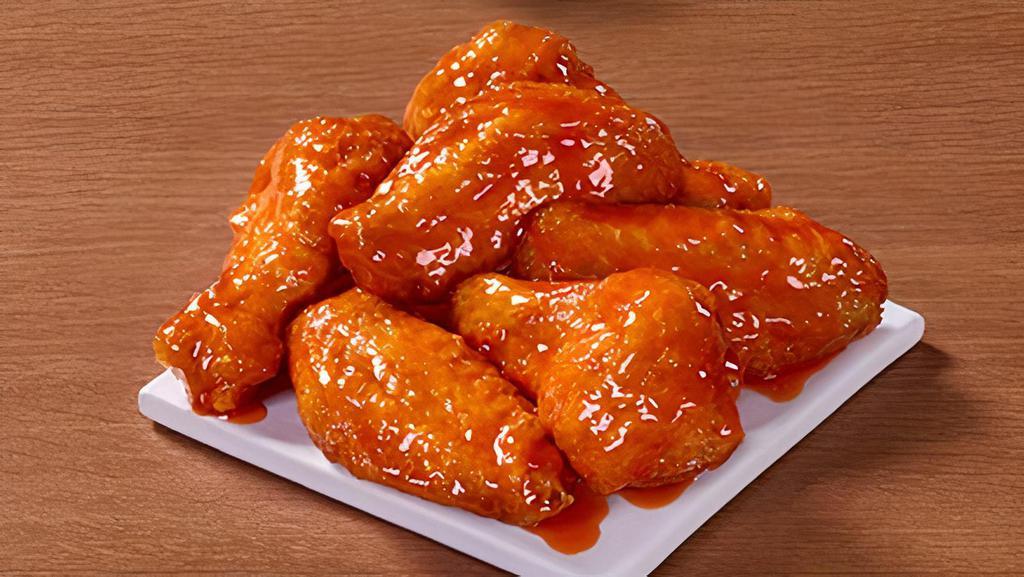 12 Traditional Wings · An order of our classic, crispy bone-in wings covered in your choice of sauce.