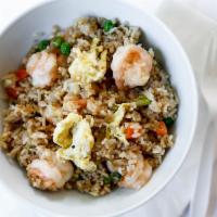 Shrimp Fried Rice · Shrimp and rice stir-fired with eggs, scallions, peas, carrots and soy sauce.