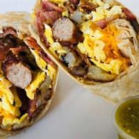 Breakfast Burrito · Huge burrito filled with eggs, bacon, sausage, breakfast potatoes, and onion.