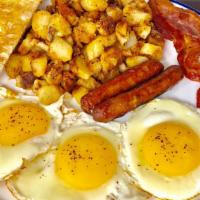 Big Breakfast · Three eggs any style and any 3 types of meat. Served with breakfast potatoes and a toast.