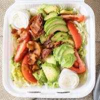 Cobb Salad · Lettuce, tomato, avocado, boiled egg, and crispy bacon tossed with ranch dressing.