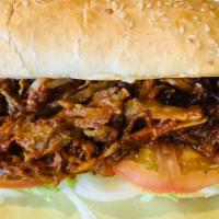 Bbq Pulled Pork Sandwich · Slowly cooked pulled BBQ pork on a French roll with mayonnaise, lettuce and tomato.