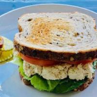 Tuna Salad Sandwich · Classic cold tuna with mayonnaise, lettuce and tomato.