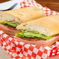 Turkey · Oven gold turkey , Provolone cheese,
lettuce, tomato, mayonnaise choice of white or wheat br...