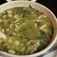 Pozole Verde · Traditional hominy soup with chicken. Served with seasonings and toppings.