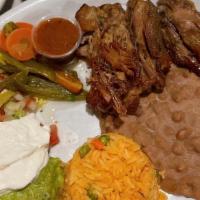 Las Carnitas De Michoacan · Prime natural pork, cambray onions, pico de gallo, crema fresca, guacamole, salsa, served wi...