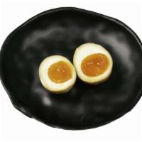 Ajitama · Soft-boiled egg marinated in our house special sauce.

Allergen Notice: Contains Egg and Soy...