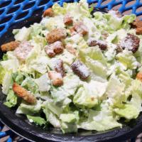 Caesar · Chopped Romain Lettuce, Caesar dressing, grated Parmeggiano cheese and Croutons.