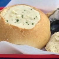 Sourdough Bread Bowl · toasted bread bowl served with oyster cracker.
Homemade clam chowder