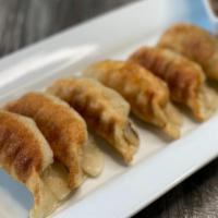 Pork Potstickers · Pan-fried pork dumpling. 6pcs