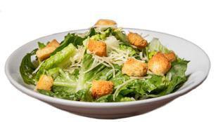 Caesar Salad · Romaine lettuce, shredded Parmesan cheese and croutons, served with Caesar dressing.