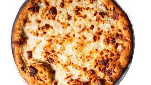 Bianco Pizza · Garlic, alfredo sauce, mozzarella, parmesan, feta cheese.