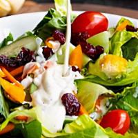 House Salad · Fresh green lettuce with house dressing.