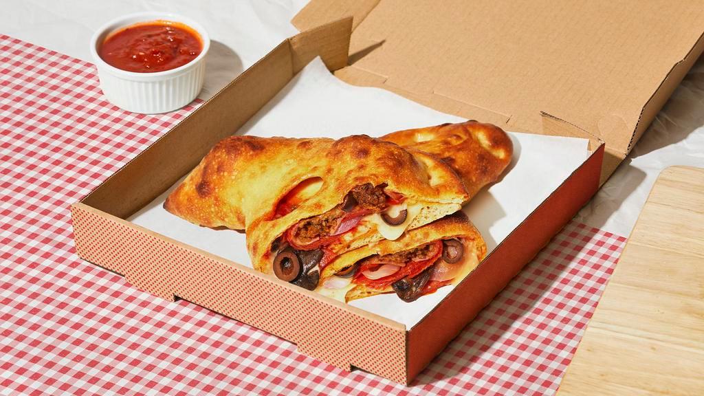Byo Calzone · Calzone with your choice of ingredients and a side of marinara.