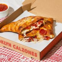 Prospect Park Calzone · Calzone with pepperoni, melted mozzarella, and a side of marinara.