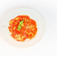 Quadrati Di Spinaci · Calabro Ricotta and Spinach Stuffed Pasta, Mutti Cherry Tomato Sauce, Basil, Parmigiano Regg...