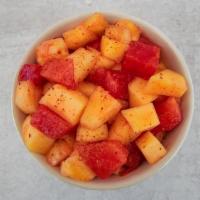 Street Style Bowl · Made with fresh cut watermelon, mango, pineapple, lime juice, Tajin® and Chamoy.