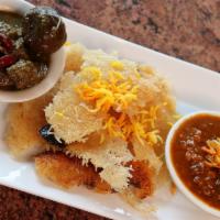 Tahdig With Stew · Crispy rice paired with choice of stew – Ghormeh Sabzi or Gheymeh