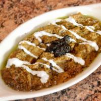 Kashk-E-Bademjoon · Traditional style dip - sautéed eggplant and caramelized onions drizzled with kashk and drie...
