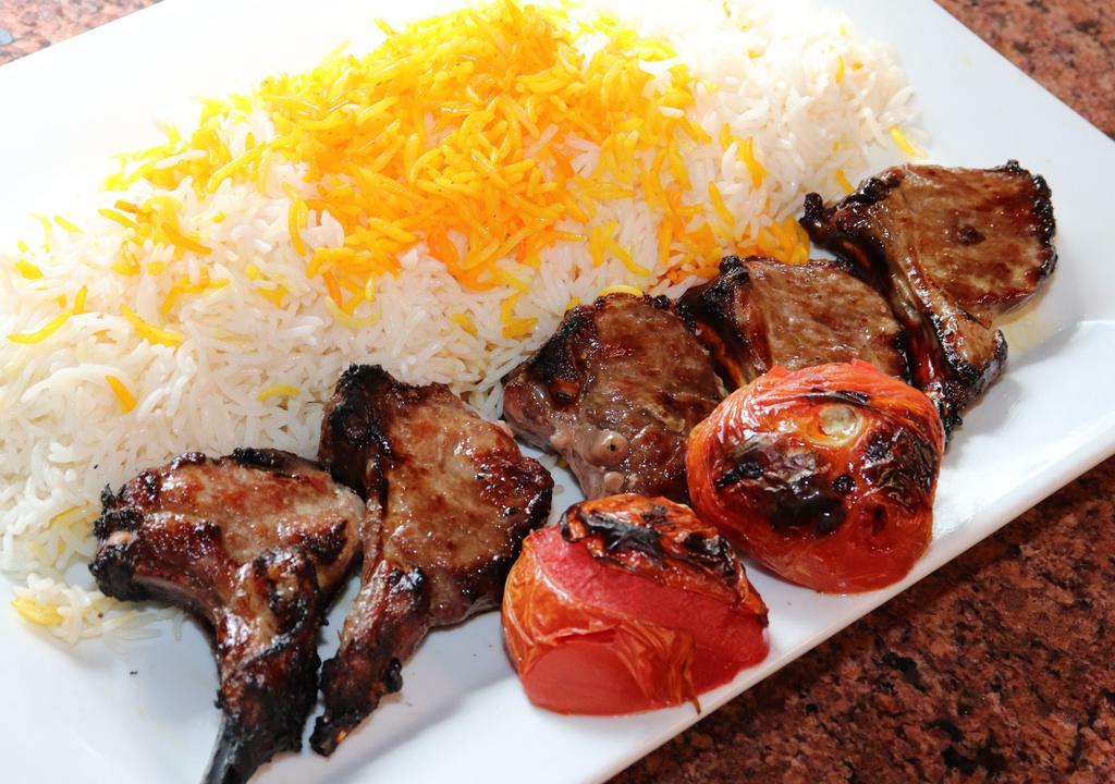 Lamb Kabob · Chunks of tender lamb, marinated in special spices and garlic, broiled on skewers over charcoal.