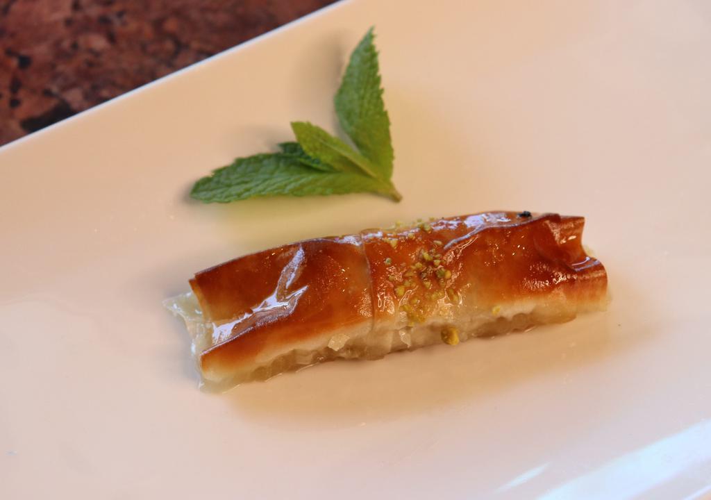 Baklava · Made with ground nuts. Pairs well with a cup of hot chai (tea)