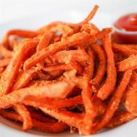 Sweet Potato Fries · Crispy sweet potato fries are deep-fried and lightly salted.