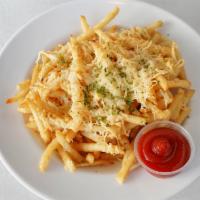 Garlic Fries · Crispy fries tossed in garlic and topped with finely chopped parsley and parmesan cheese.