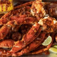 Snow Crab Legs (1 Lb) · 2 clusters of snow crab legs filled with juicy crab meat, covered with your choice of season...