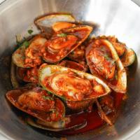 Mussel · New Zealand Green Lipped Mussels covered in one of our savory sauces and spice level of your...