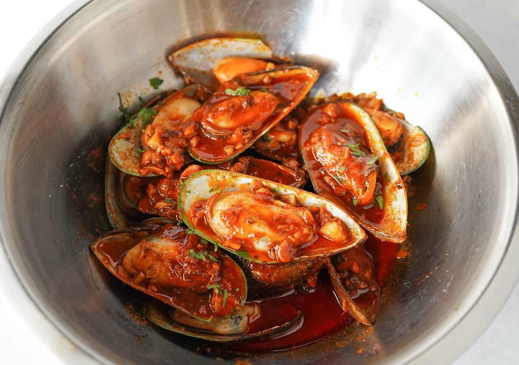 Mussel · New Zealand Green Lipped Mussels covered in one of our savory sauces and spice level of your choice.

Price Per LB.