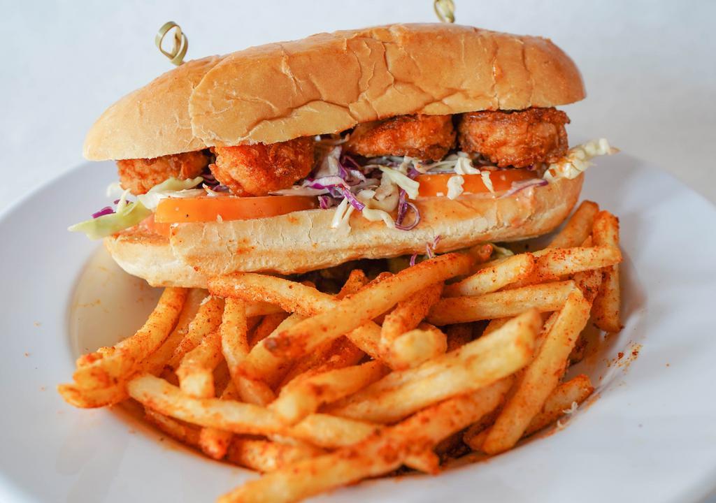 Po Boy'S Sandwiches With Fries · Your choice of protein, deep-fried and tossed with our signature Cajun seasoning. The sandwich comes with cajun mayo, coleslaw, and tomatoes on a french roll. Served with a side of cajun fries.