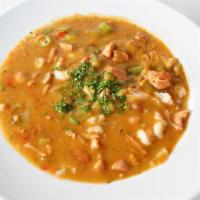 Gumbo Soup · Our hearty soup with fresh okra, and fresh shrimp, mixed with andouille pork sausage, and ch...