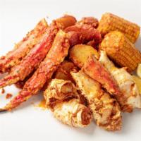King Crab Legs (1 Lbs) · Comes with 2 corns, 5 potatoes, and 5 sausages. Whole Lb of Giant King Crab Legs.